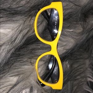 Women’s yellow Prada eyeglasses